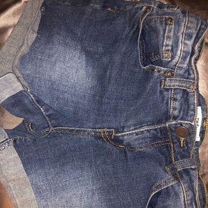 Distressed blue jean shorts